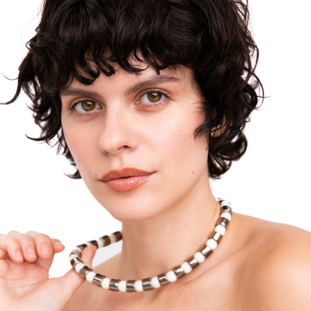 COIN & MOTHER OF PEARL SUNDRY.  BEAD ONE.