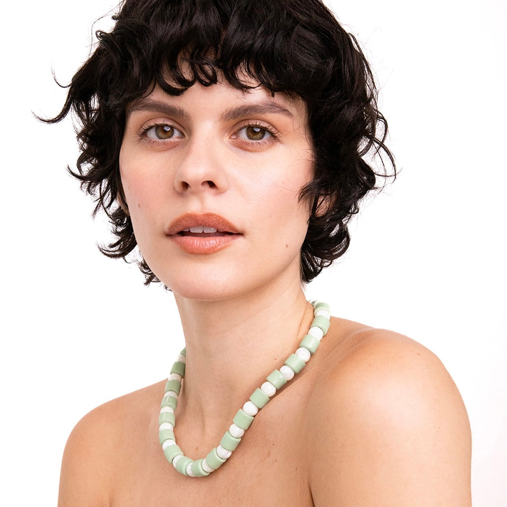 AMBROSIA & MOTHER OF PEARL SUNDRY.  BEAD ONE.