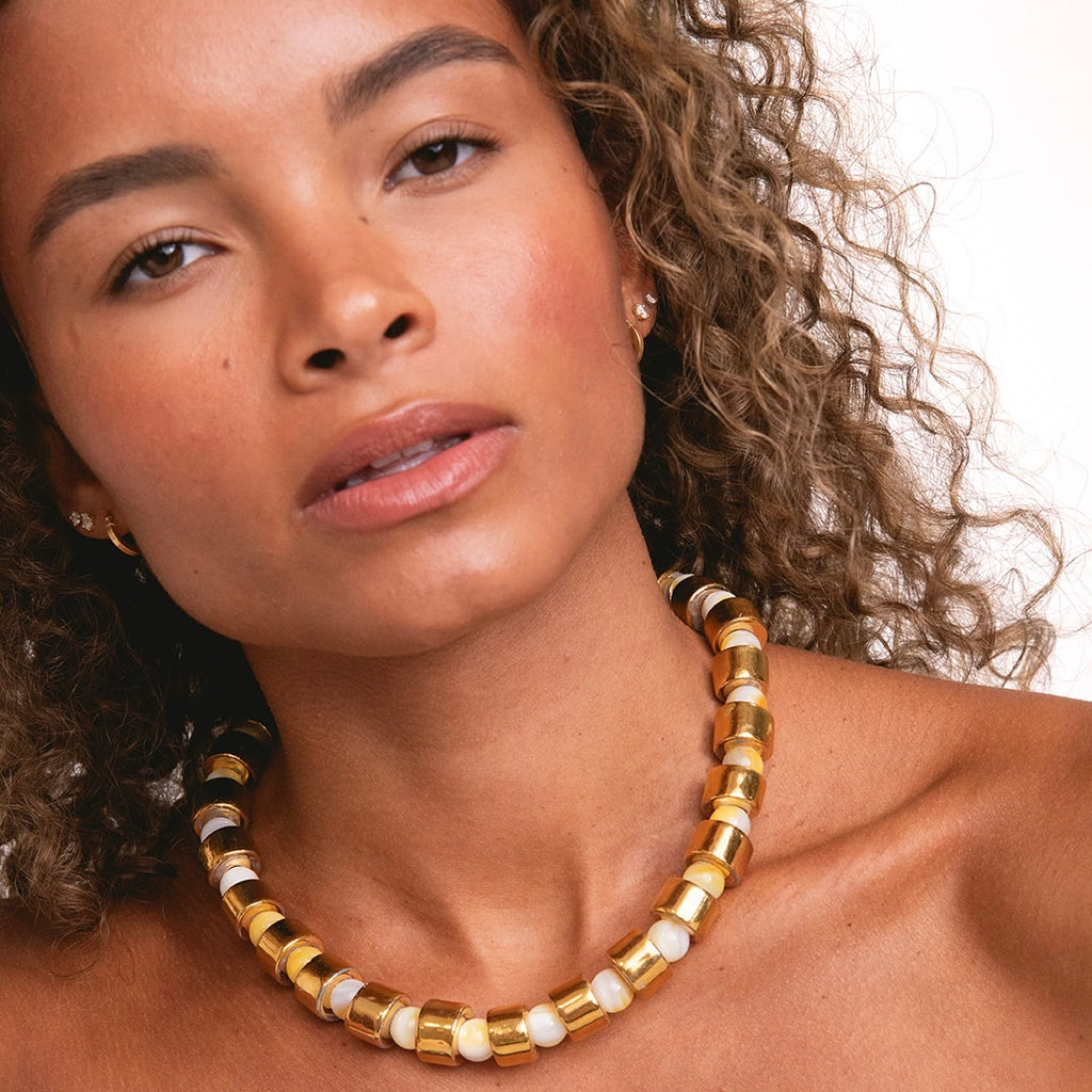 KARAT & BUTTERSCOTCH MOTHER OF PEARL SUNDRY.  BEAD TWO.