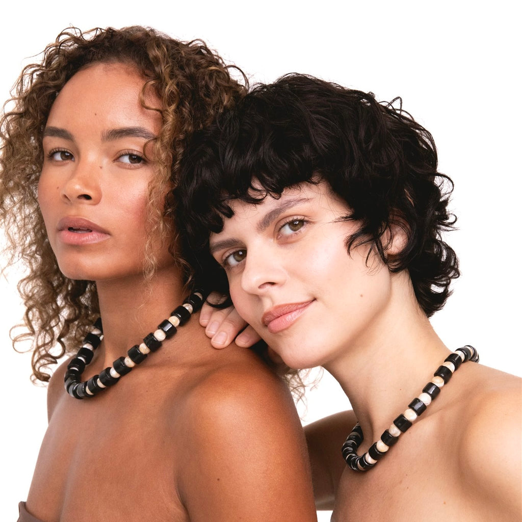 TAP & CONCH MOTHER OF PEARL SUNDRY.  BEAD TWO.