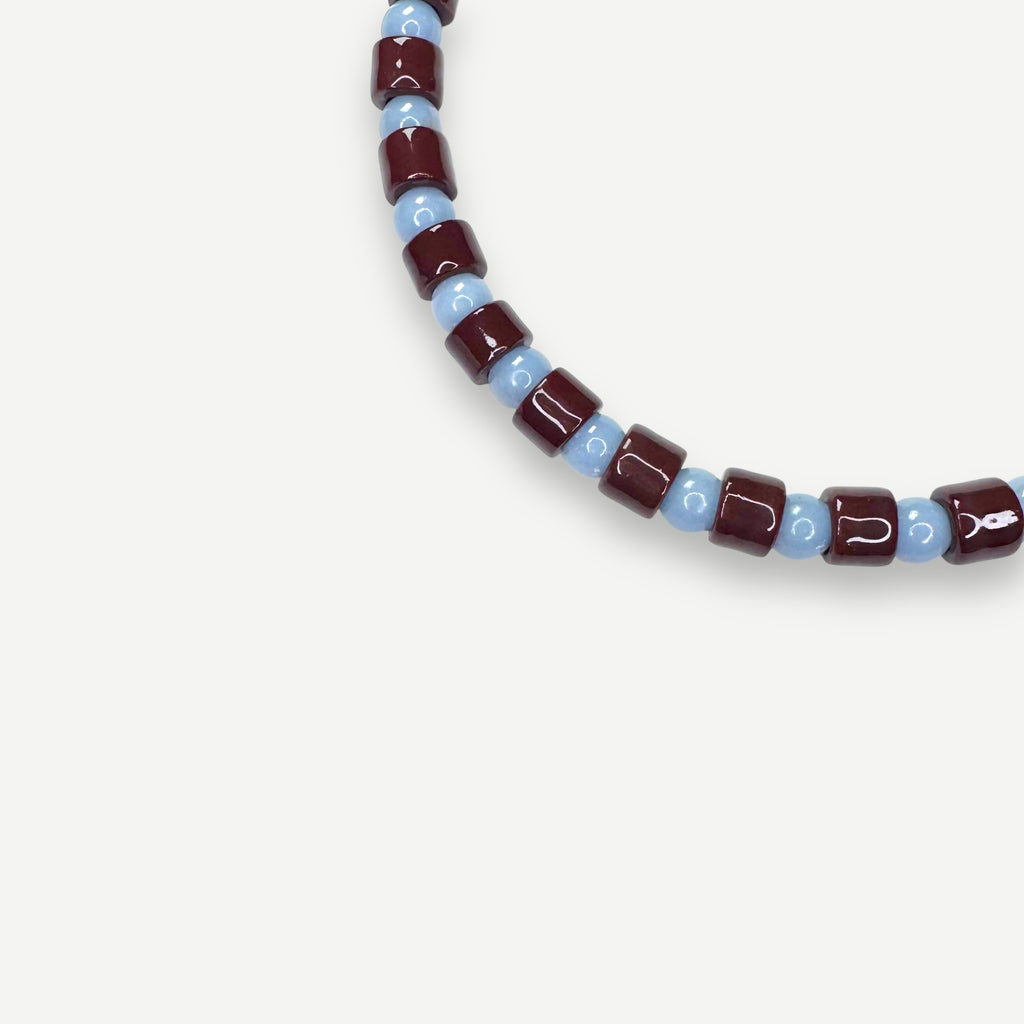 WALNUT & ANGELITE SUNDRY.  BEAD ONE.