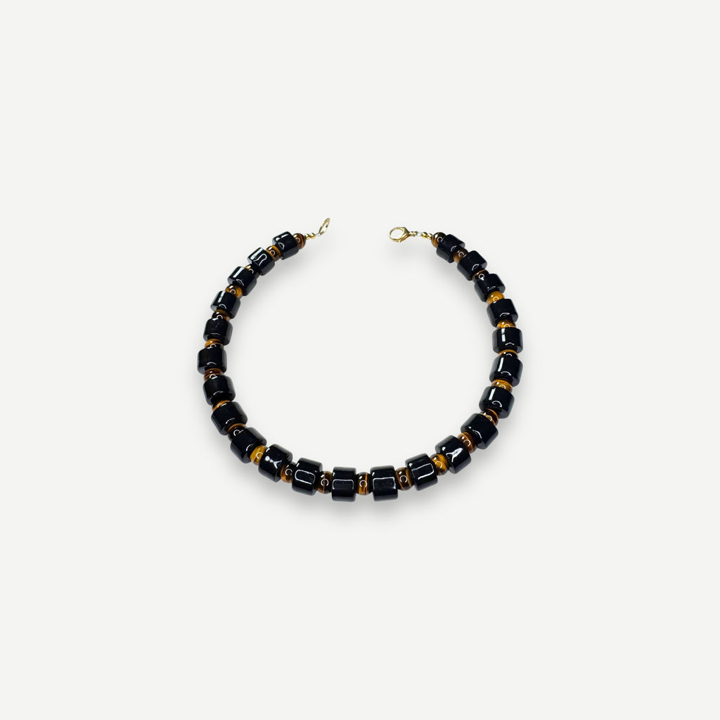 TAP & TIGERS EYE SUNDRY.  BEAD TWO.