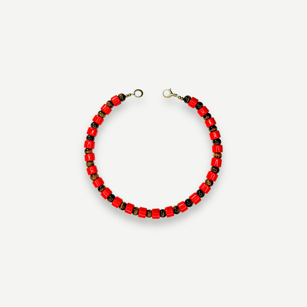 LOBSTER & TIGERS EYE SUNDRY.  BEAD ONE.