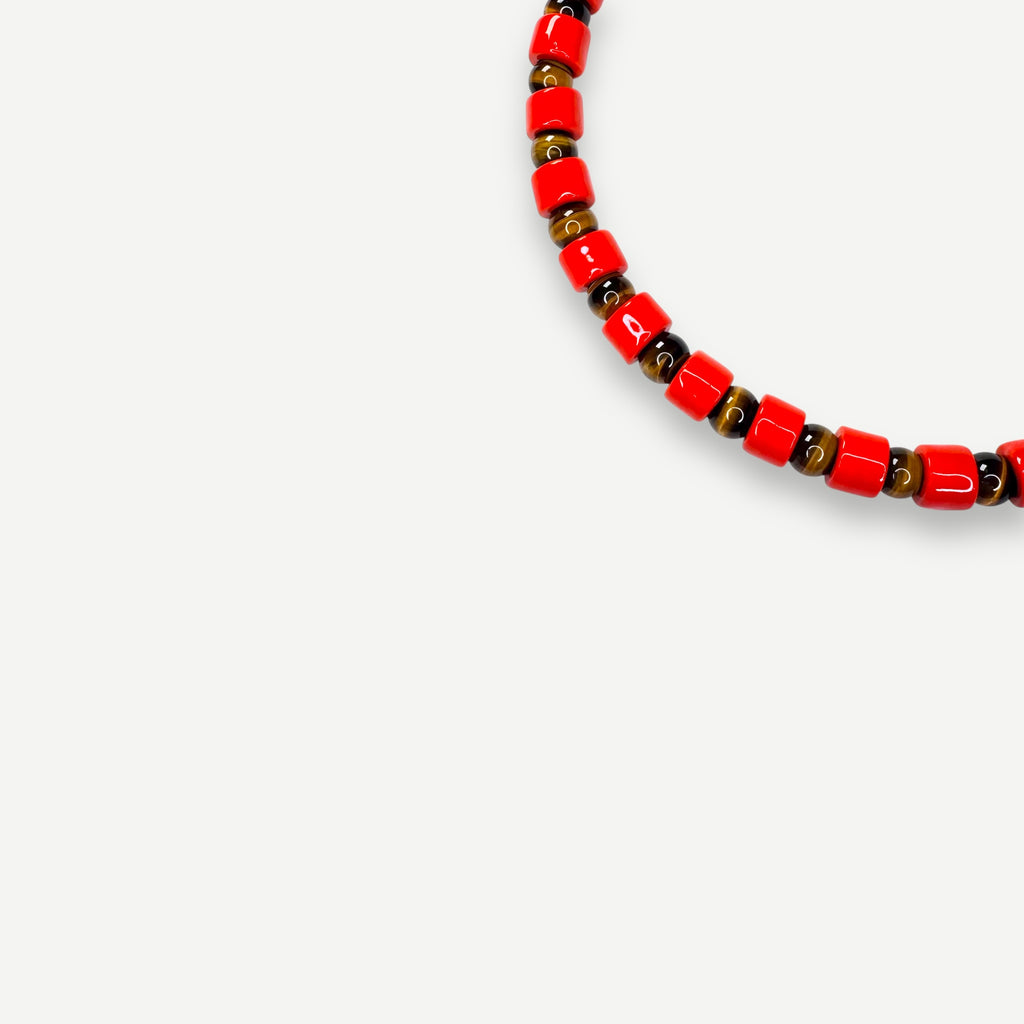 LOBSTER & TIGERS EYE SUNDRY.  BEAD ONE.