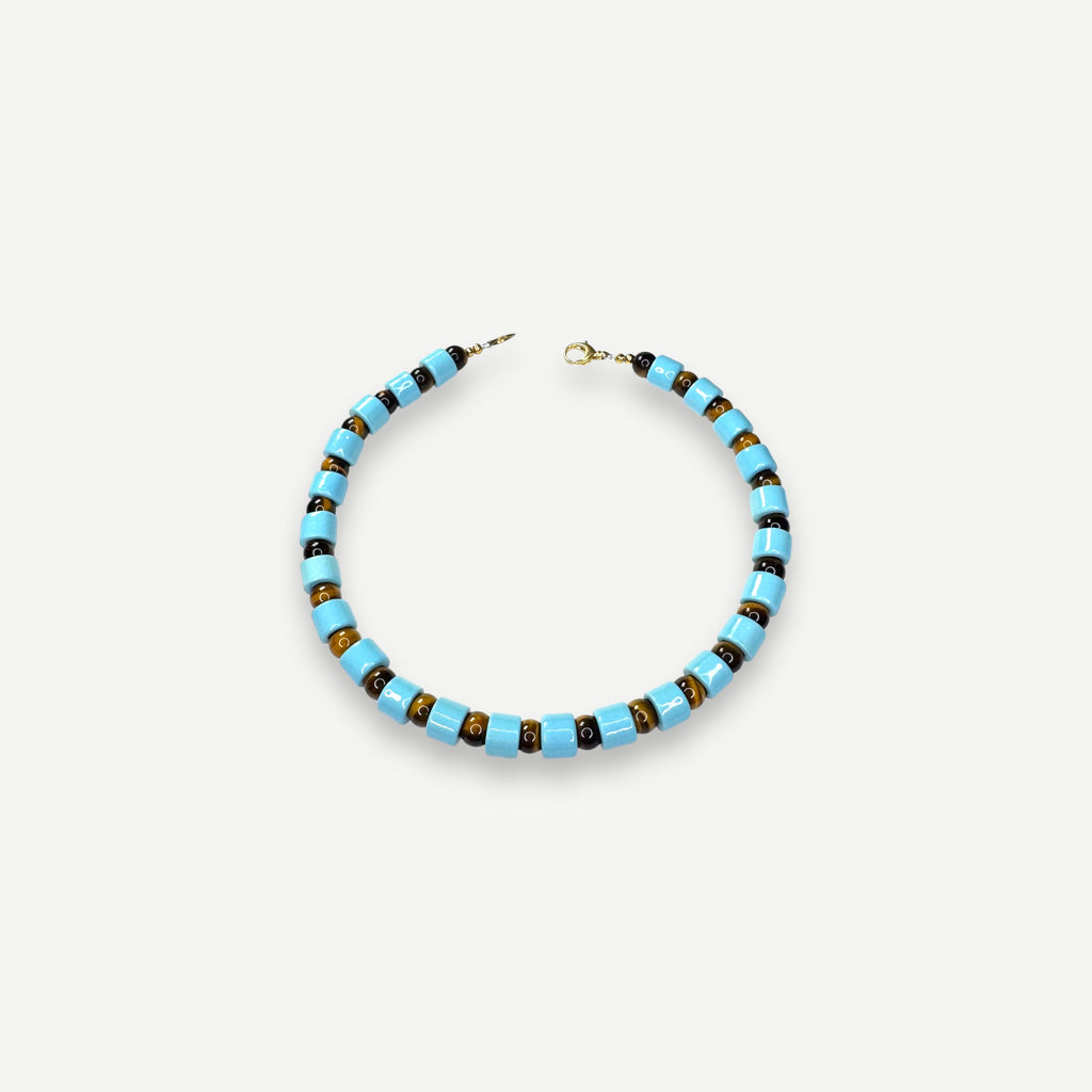 POOL & TIGERS EYE SUNDRY.  BEAD ONE.
