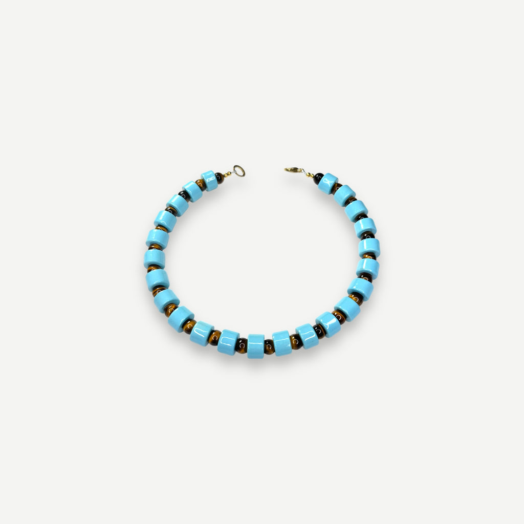 POOL & TIGERS EYE SUNDRY.  BEAD TWO.