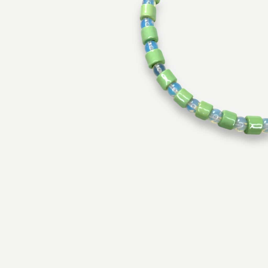 AMBROSIA & OPALITE SUNDRY.  BEAD ONE.