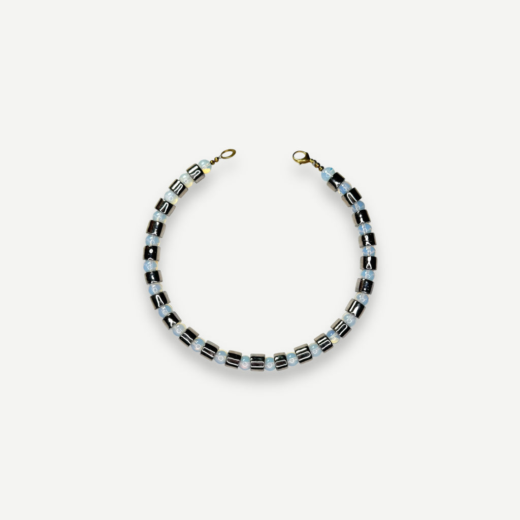 COIN & OPALITE SUNDRY.  BEAD ONE.