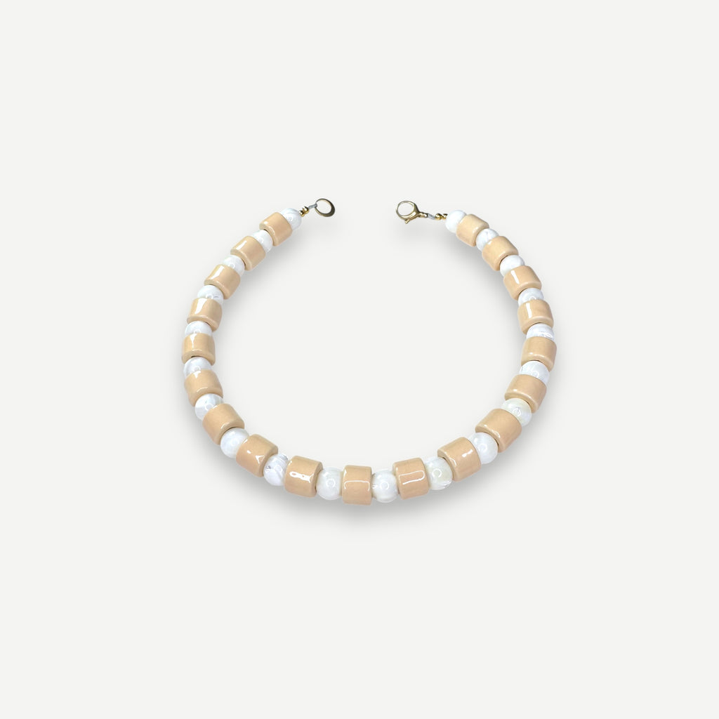 CREPE & MOTHER OF PEARL SUNDRY.  BEAD TWO.