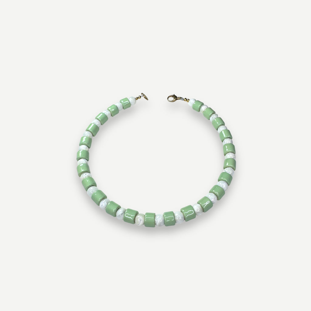AMBROSIA & MOTHER OF PEARL SUNDRY.  BEAD ONE.