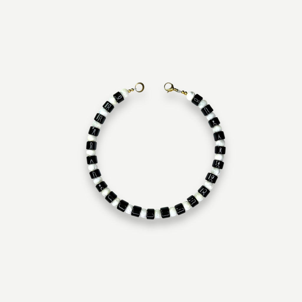 TAP & MOTHER OF PEARL SUNDRY.  BEAD ONE.