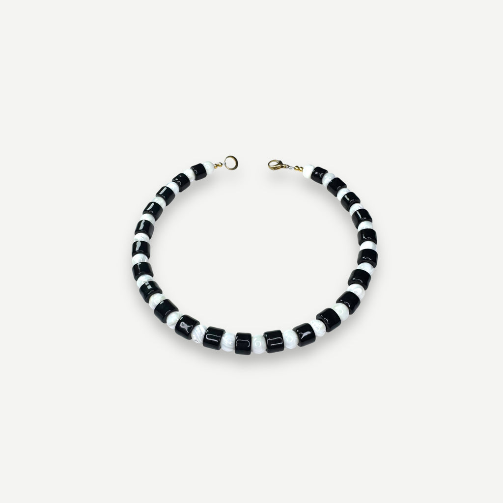 TAP & MOTHER OF PEARL SUNDRY.  BEAD ONE.