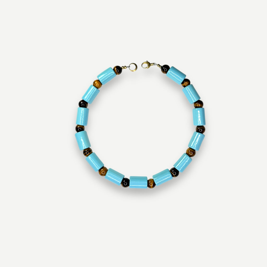 POOL & TIGERS EYE SUNDRY.  BEAD FIVE.