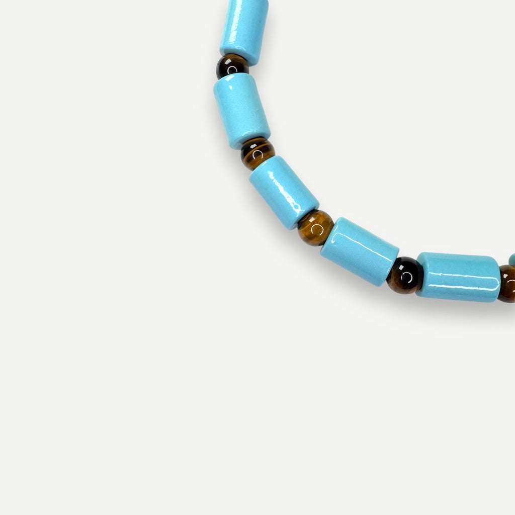 POOL & TIGERS EYE SUNDRY.  BEAD FIVE.