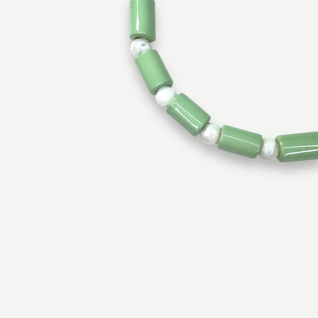 AMBROSIA & MOTHER OF PEARL SUNDRY.  BEAD FIVE.