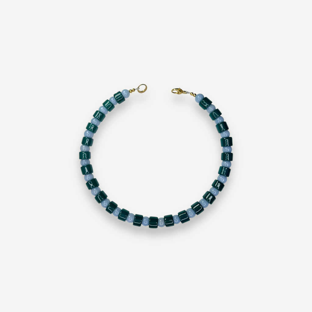 BOTTLE & ANGELITE SUNDRY.  BEAD ONE.