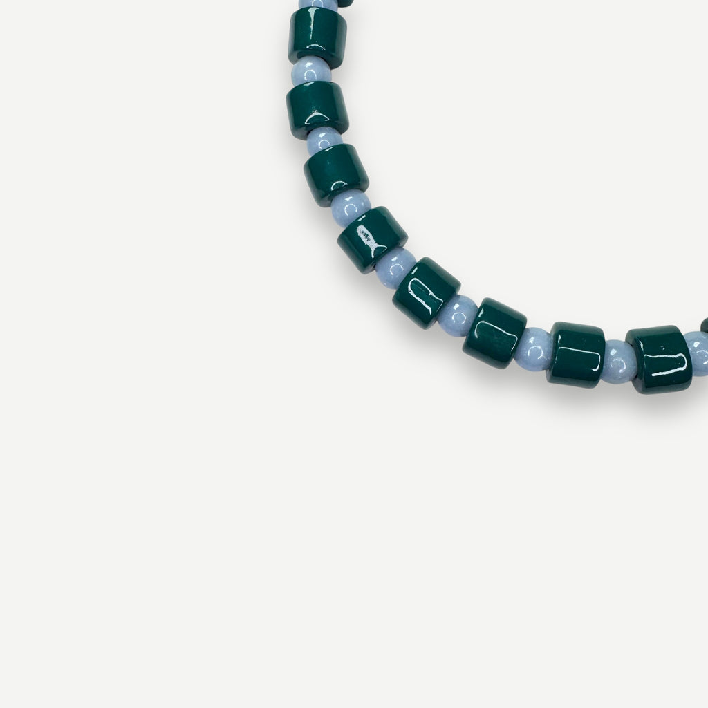 BOTTLE & ANGELITE SUNDRY.  BEAD ONE.
