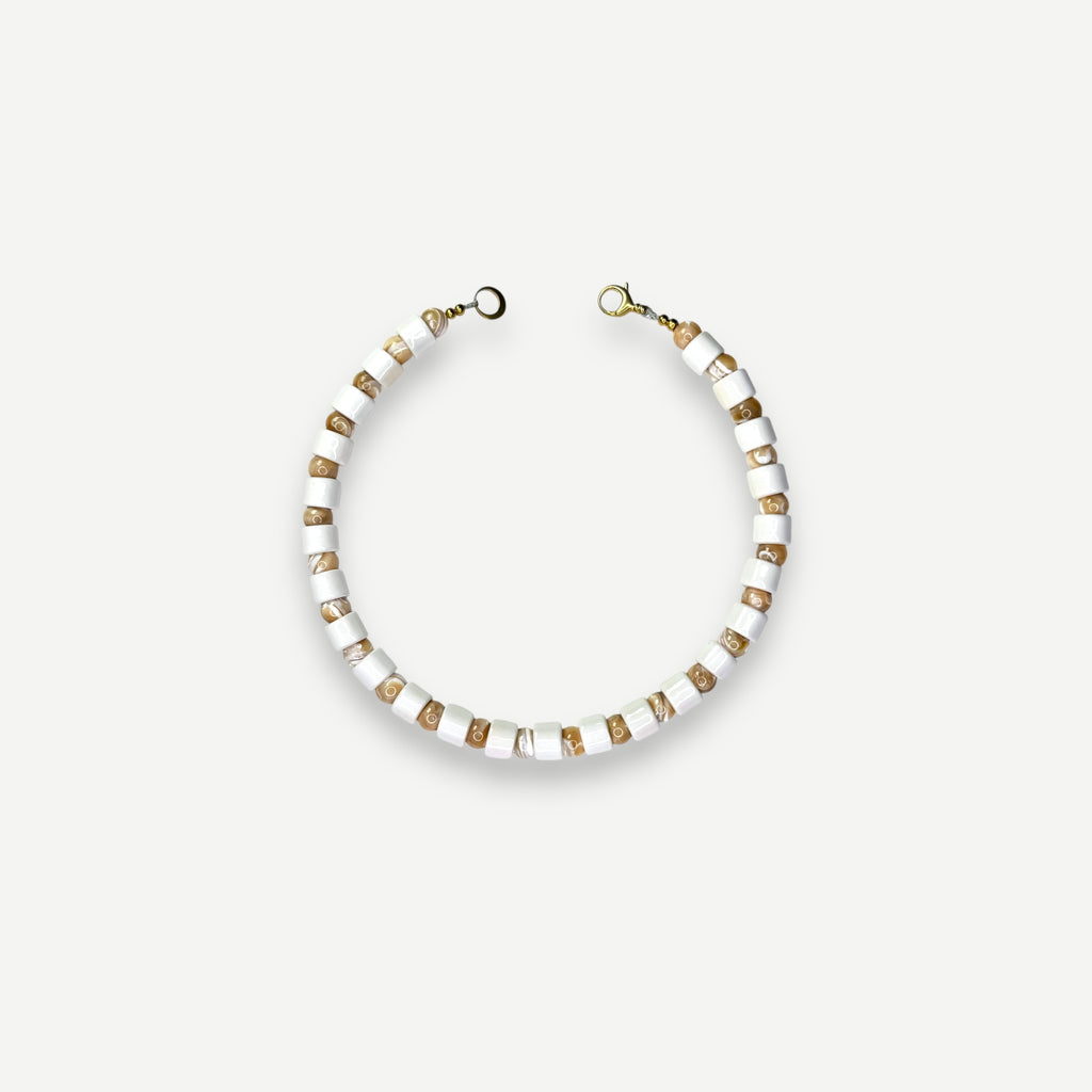 BLANK & CONCH MOTHER OF PEARL SUNDRY.  BEAD ONE.