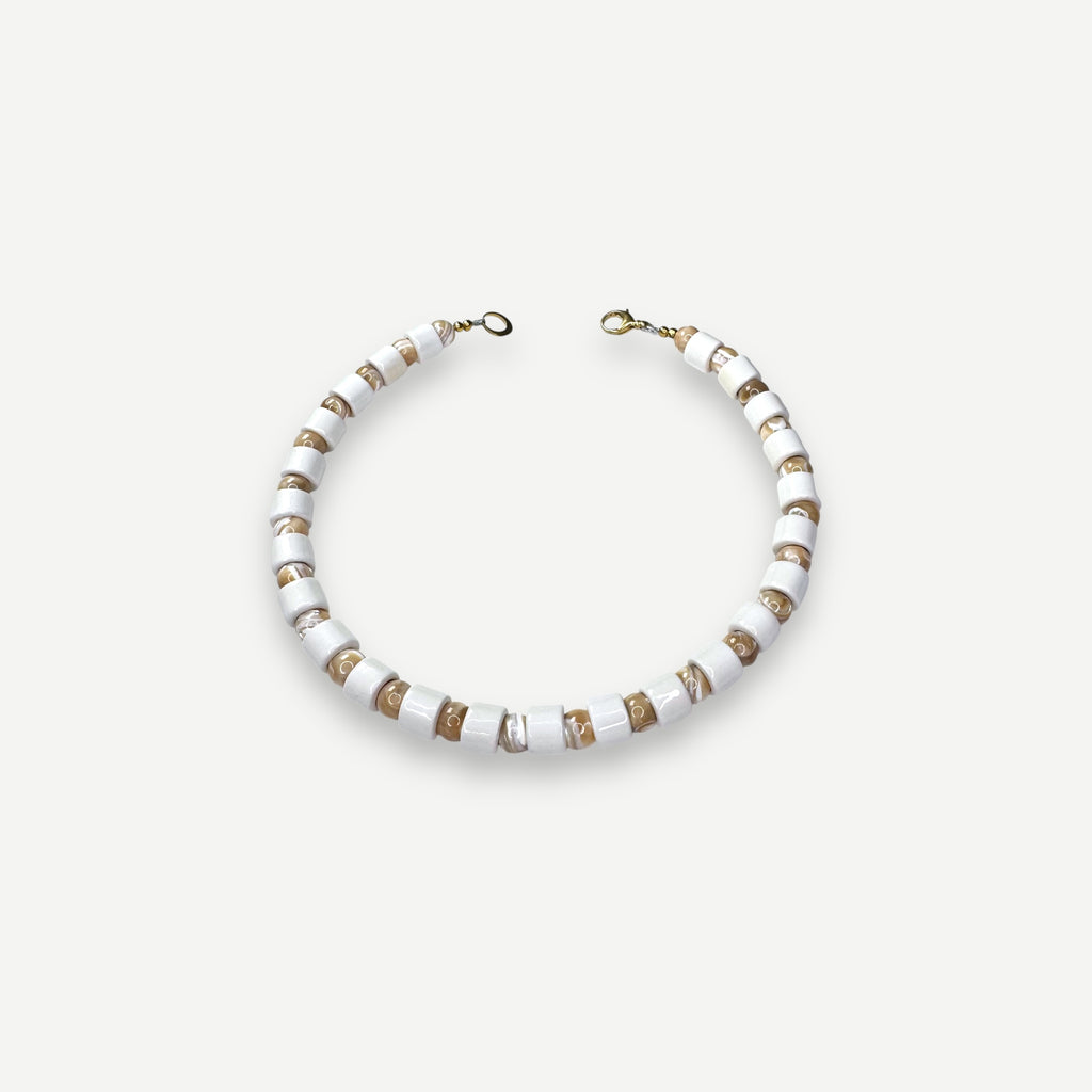 BLANK & CONCH MOTHER OF PEARL SUNDRY.  BEAD ONE.