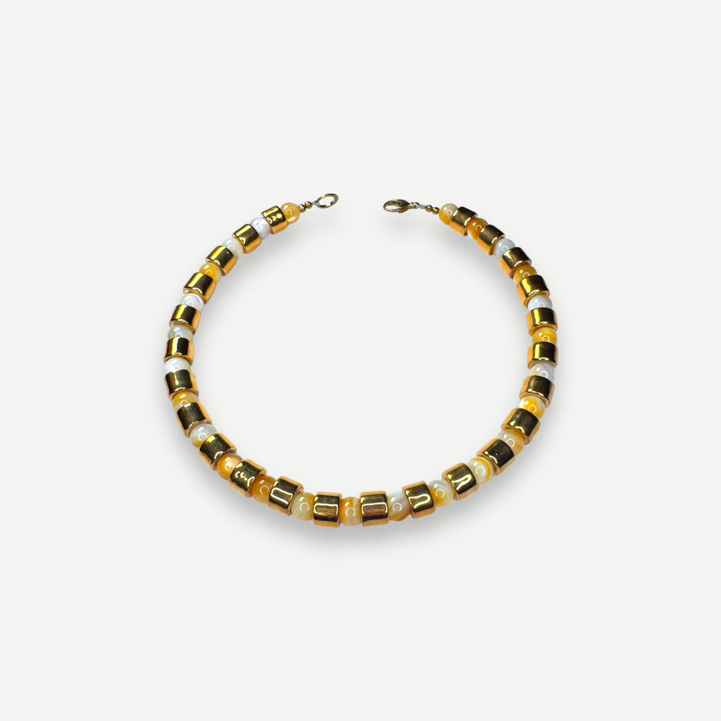 KARAT & BUTTERSCOTCH MOTHER OF PEARL SUNDRY.  BEAD ONE.