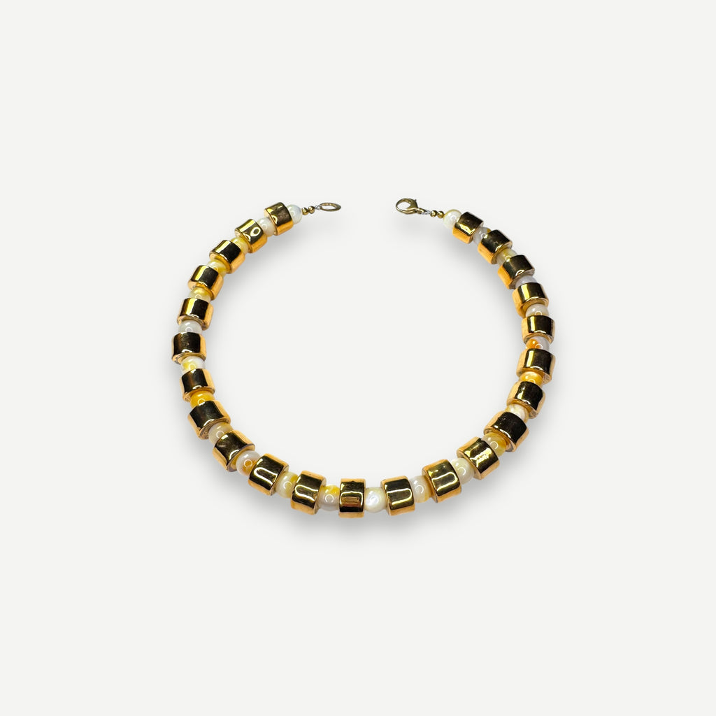 KARAT & BUTTERSCOTCH MOTHER OF PEARL SUNDRY.  BEAD TWO.