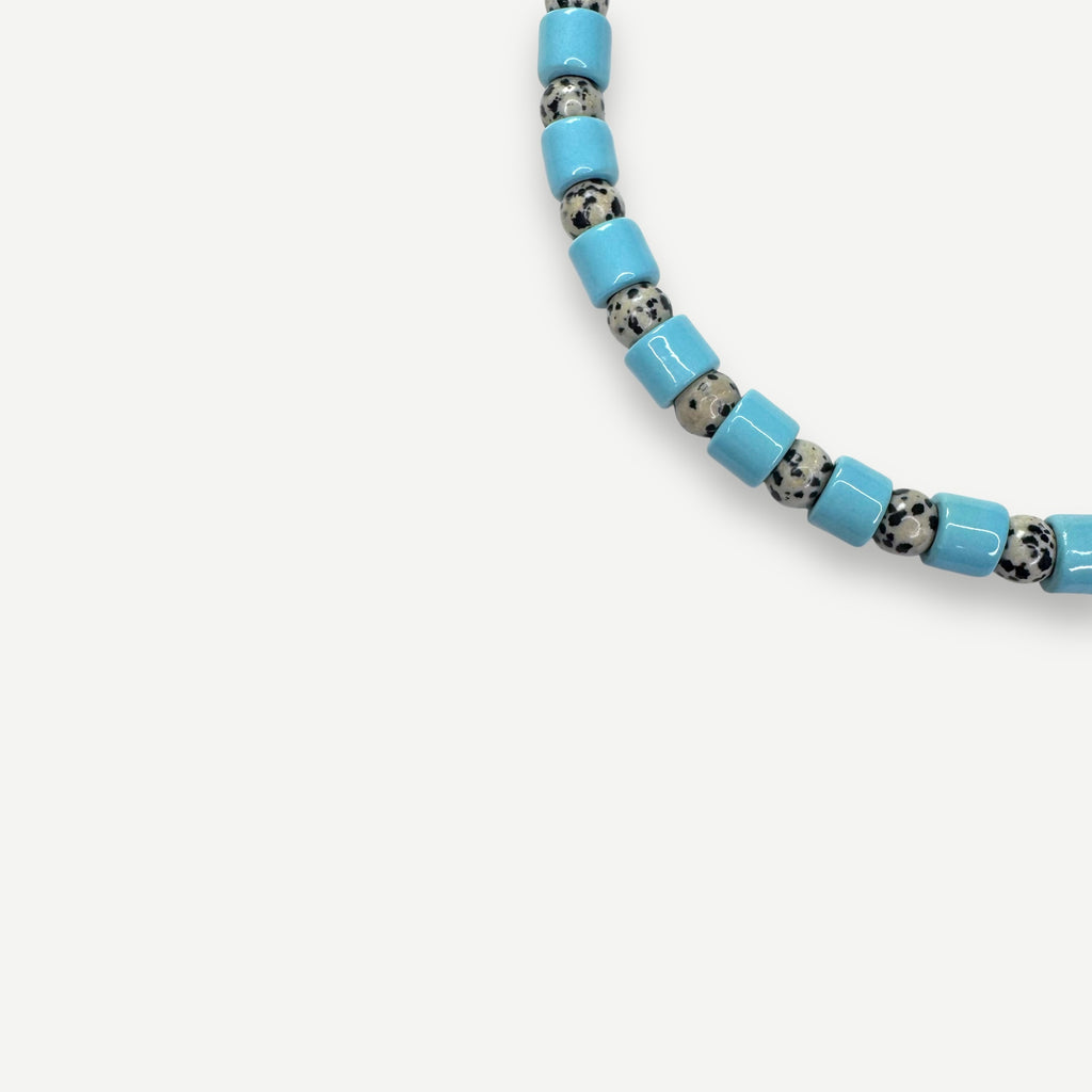 POOL &  DALMATIAN JASPER SUNDRY.  BEAD ONE.